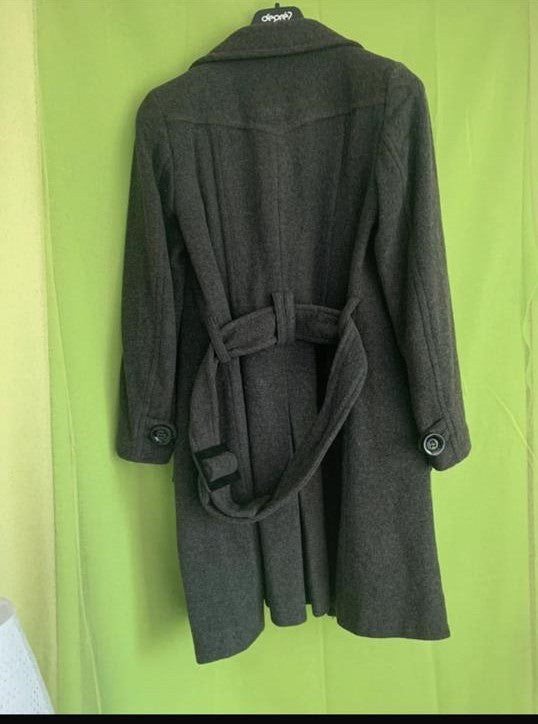 Manteau 🧥 noir de gros bouton